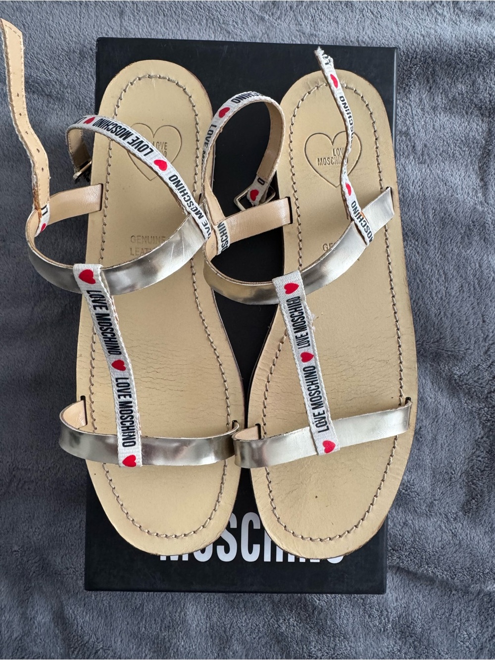 Moschino Silver Leather T-Strap Sandals with Branded Heart Webbing